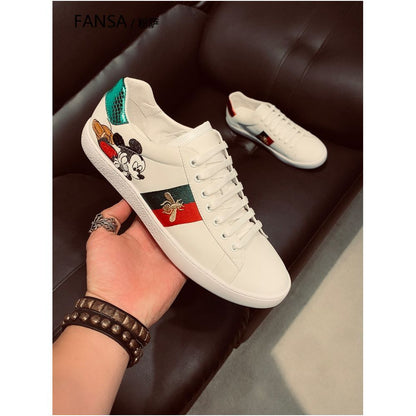 Luxury white sneakers for men genuine leather couple s sneakers bee and Mickey Mouse cartoon style casual breathable versatile European style men s shoes image 0