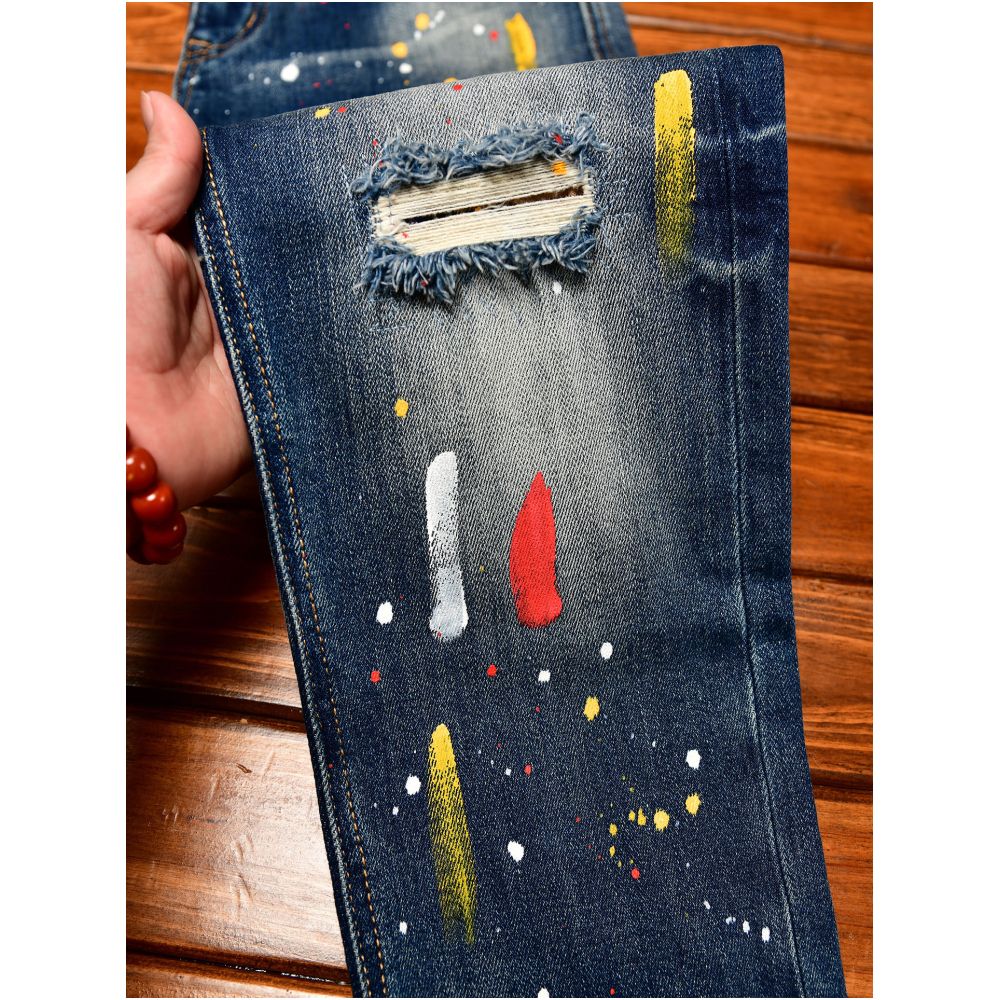 Trendy Korean style men s jeans with ripped patches blue paint spray slim fit American style autumn and winter trousers image 2